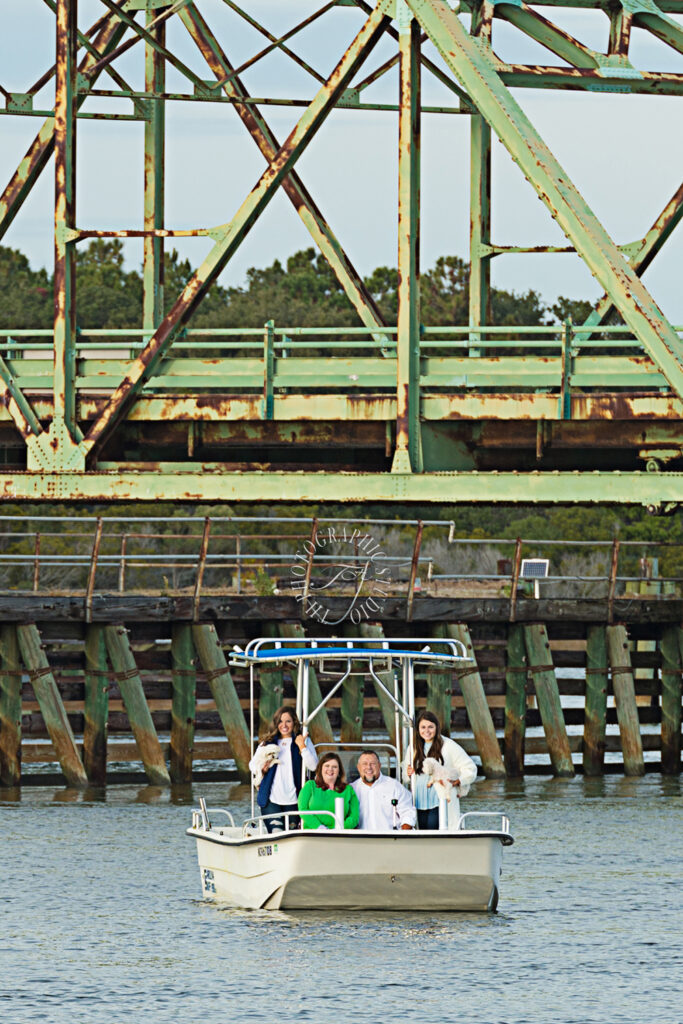 A-Picture-Of-A-Family-On-Their-Boat-By-The-Surf-City-Swing-Bridge-To-Use-For-A-Christmas-Card